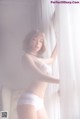 Beautiful Napasorn Sudsai in white lingerie (11 photos)